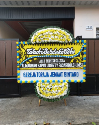 Papan Bunga Duka di Dempio Makmur